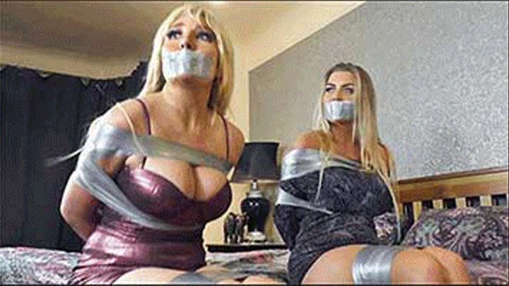 Dixie & Daisy in: The Night They Came for Dixie's Riches: Buxom Financiers Discovered Struggling Trussed & Gagged in the Master Bedroom! (HD)