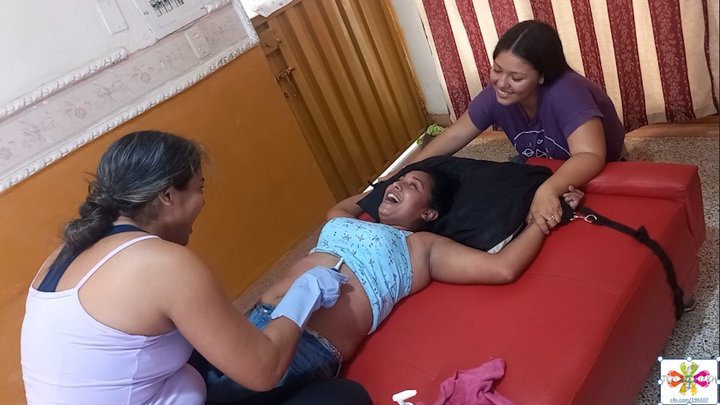 Dori Eli Receives tickling in the armpits and abdomen