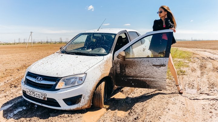 CAR STUCK  Julia got stuck in the mud doing a test drive