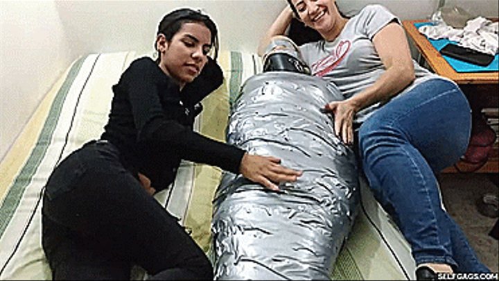 Laura, Katherine & Maria in: Katherine Martinez Collared And Pantyhose Hooded In Multilayered Mummification Bondage (mp4)