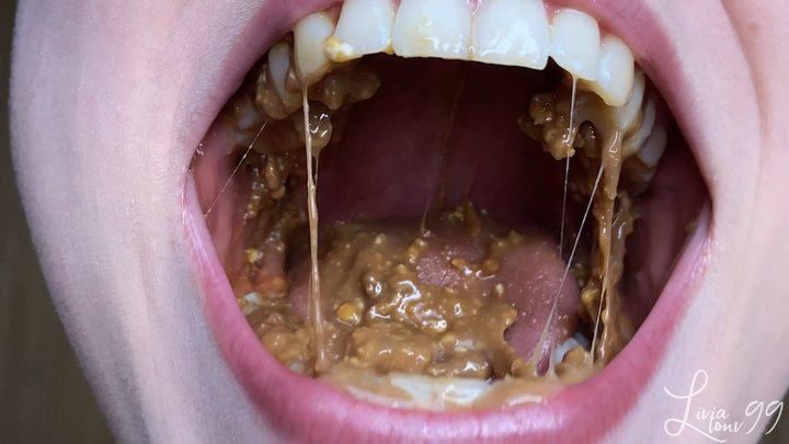 Chewing snickers bar (chocolate, peanuts, caramel) full HD mp4