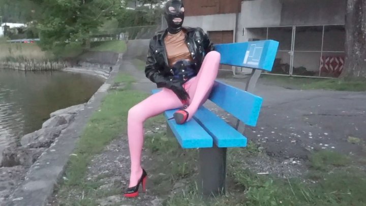 Pierced Latex Girl in Pink Leggings, Blouse,  Jacket, Demask  Corsett & Mask Gloves walks in the city with piercings rings hanging out & Masturbating Rubber Dildo PART II